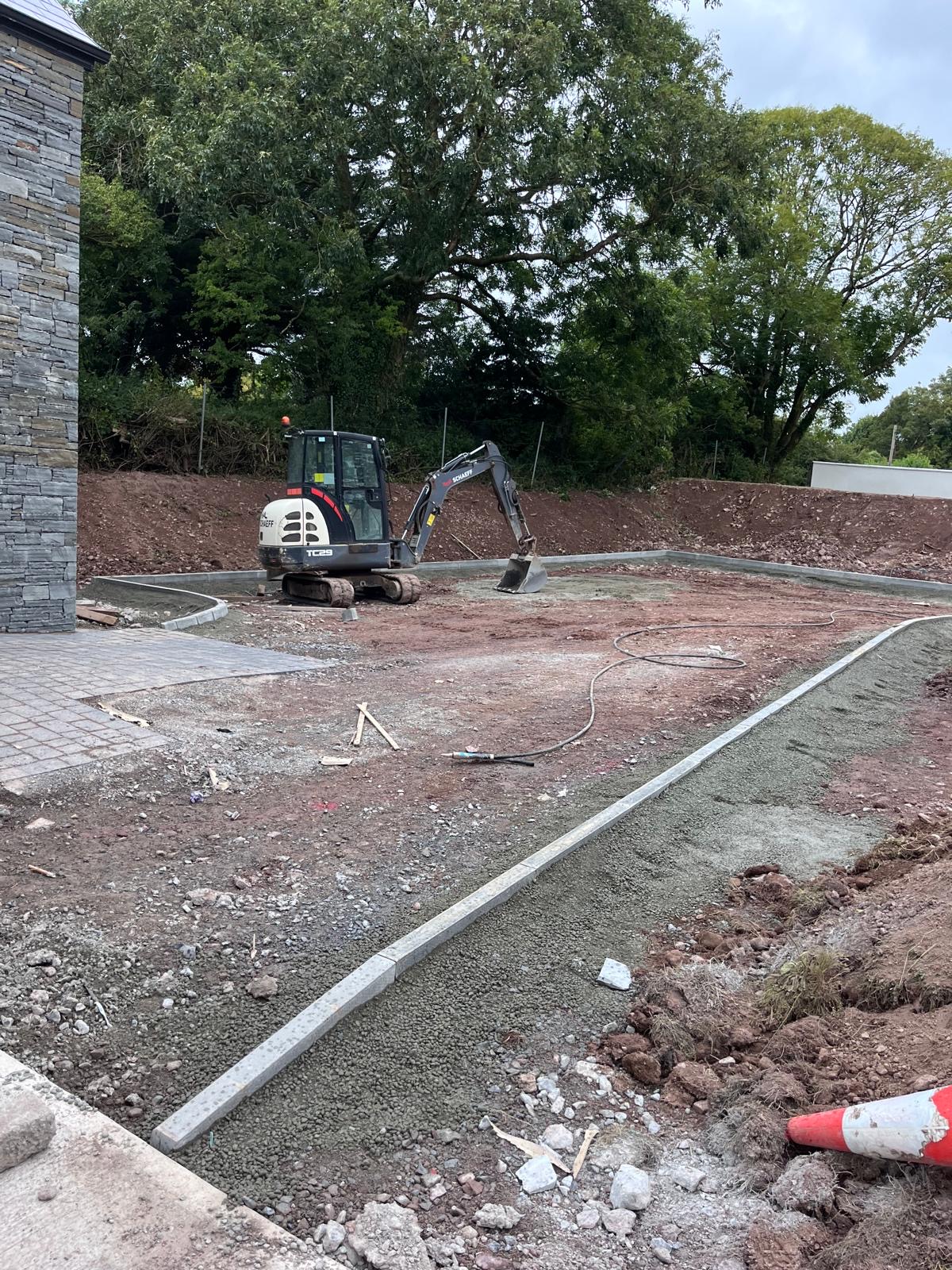 Compacting the driveway base