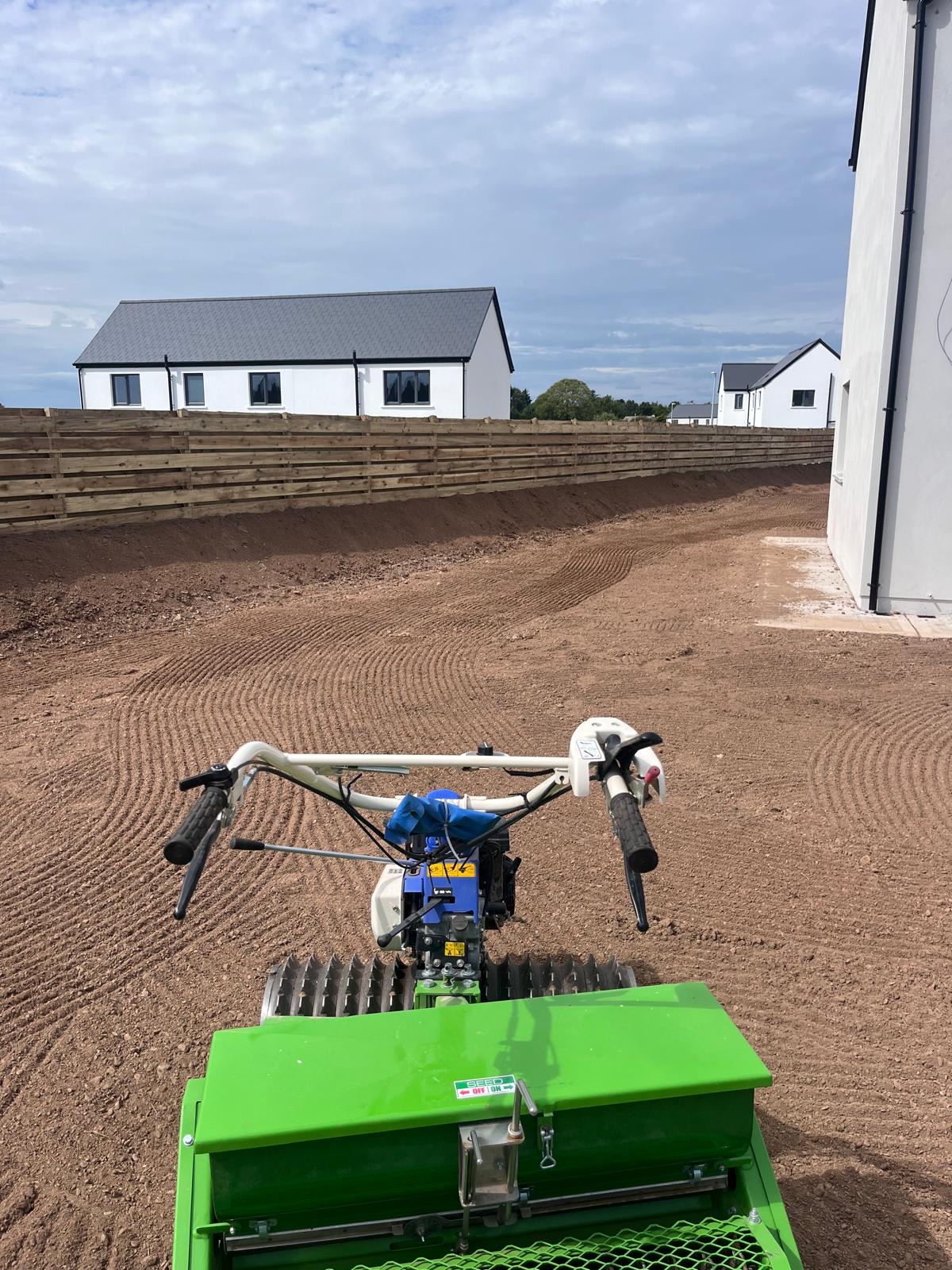 Power-harrowing beside the fence