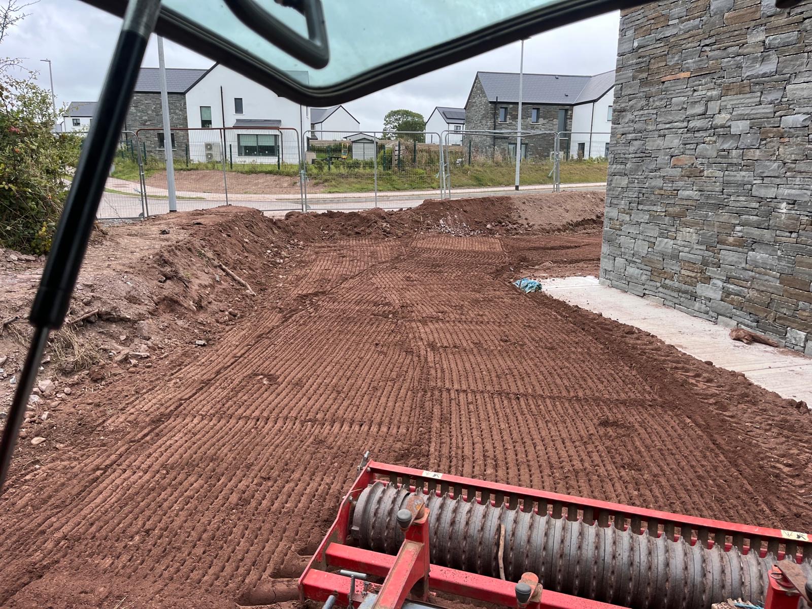 Rolling the levelled soil