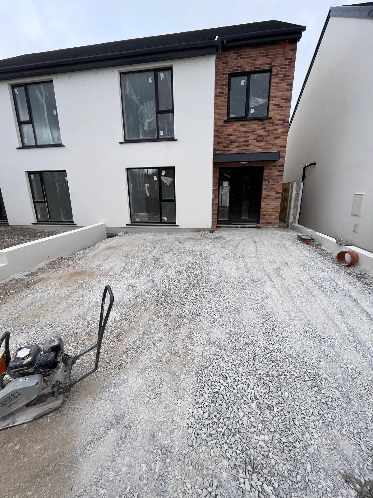 Compacting the driveway base
