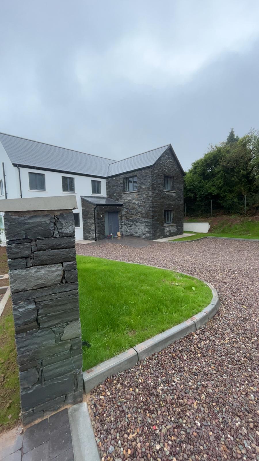 Gravel drive, stone pier & new lawn